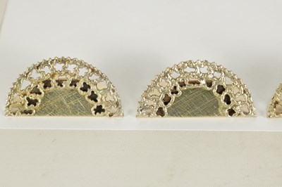 Lot 451 - A SET OF SIX STUART DEVLIN SILVER GILT MENU HOLDERS