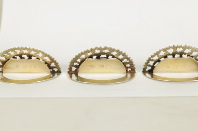 Lot 451 - A SET OF SIX STUART DEVLIN SILVER GILT MENU HOLDERS