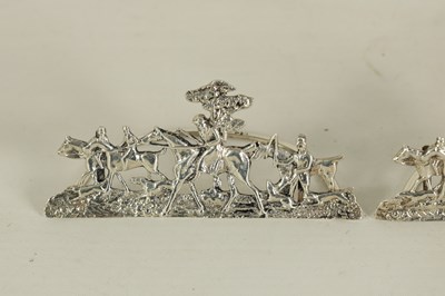 Lot 338 - A SET OF FOUR LARGE CAST SILVER HUNTING SCENE MENU HOLDERS