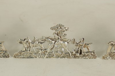 Lot 338 - A SET OF FOUR LARGE CAST SILVER HUNTING SCENE MENU HOLDERS