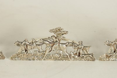 Lot 338 - A SET OF FOUR LARGE CAST SILVER HUNTING SCENE MENU HOLDERS