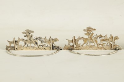 Lot 338 - A SET OF FOUR LARGE CAST SILVER HUNTING SCENE MENU HOLDERS