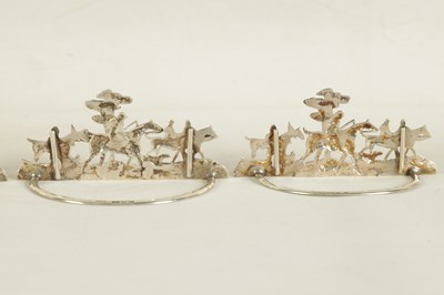 Lot 338 - A SET OF FOUR LARGE CAST SILVER HUNTING SCENE MENU HOLDERS