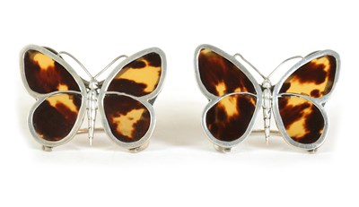 Lot 365 - A PAIR OF SILVER AND TORTOISESHELL BUTTERFLY MENU HOLDERS