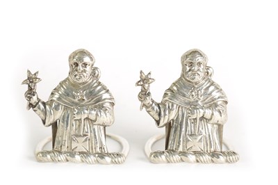 Lot 334 - A PAIR OF SILVER FIGURAL MENU HOLDERS