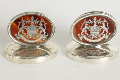 Lot 328 - A SET OF FOUR SILVER AND TORTOISESHELL ARMORIAL MENU HOLDERS