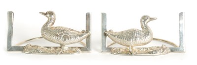 Lot 414 - A PAIR OF LARGE EMBOSSED SILVER DUCK MENU HOLDERS