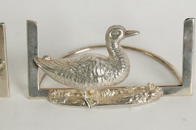 Lot 414 - A PAIR OF LARGE EMBOSSED SILVER DUCK MENU HOLDERS