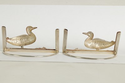 Lot 414 - A PAIR OF LARGE EMBOSSED SILVER DUCK MENU HOLDERS