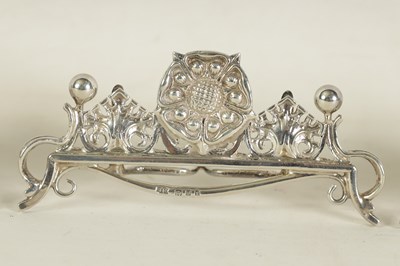 Lot 431 - A SET OF FOUR OMAR RAMSDEN SILVER ARTS AND CRAFTS MENU HOLDERS