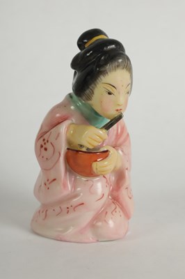 Lot 38 - JAPANESE GIRL. A RARE ROYAL WORCESTER CANDLE EXTINGUISHER