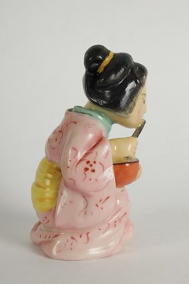 Lot 38 - JAPANESE GIRL. A RARE ROYAL WORCESTER CANDLE EXTINGUISHER
