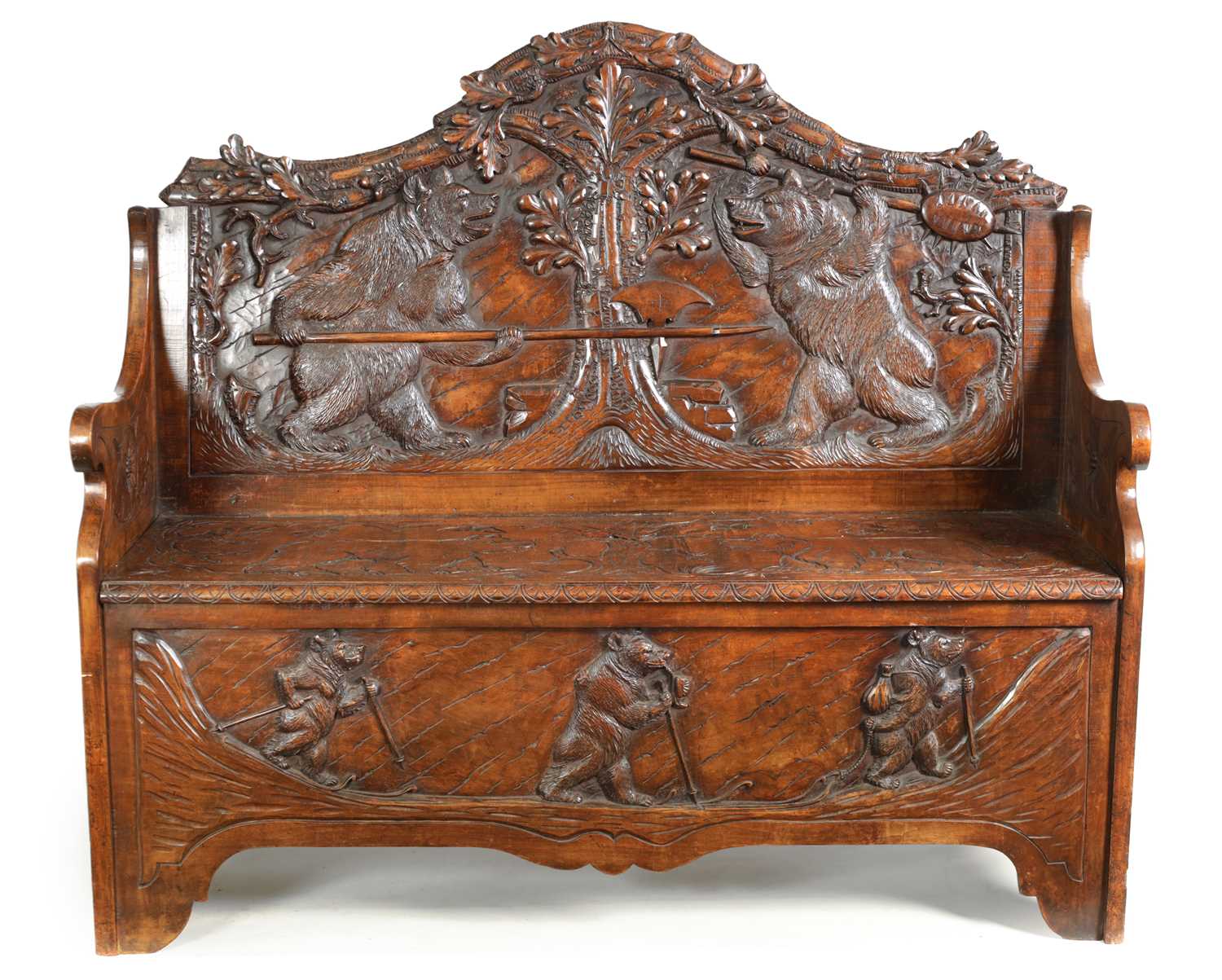 Lot 1037 - AN EARLY 20TH CENTURY CARVED LINDEN WOOD BLACK FOREST HALL BENCH