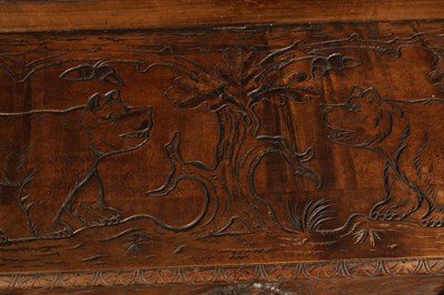 Lot 1037 - AN EARLY 20TH CENTURY CARVED LINDEN WOOD BLACK FOREST HALL BENCH