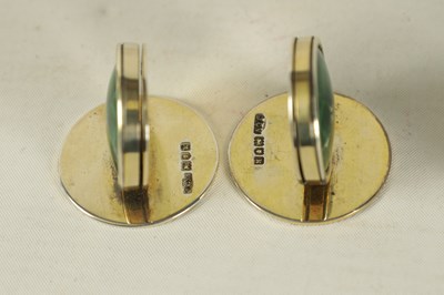 Lot 344 - A CASED SET OF FOUR SILVER AND MOTHER OF PEARL SHAMROCK MENU HOLDERS