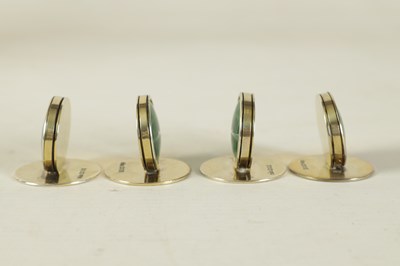 Lot 344 - A CASED SET OF FOUR SILVER AND MOTHER OF PEARL SHAMROCK MENU HOLDERS