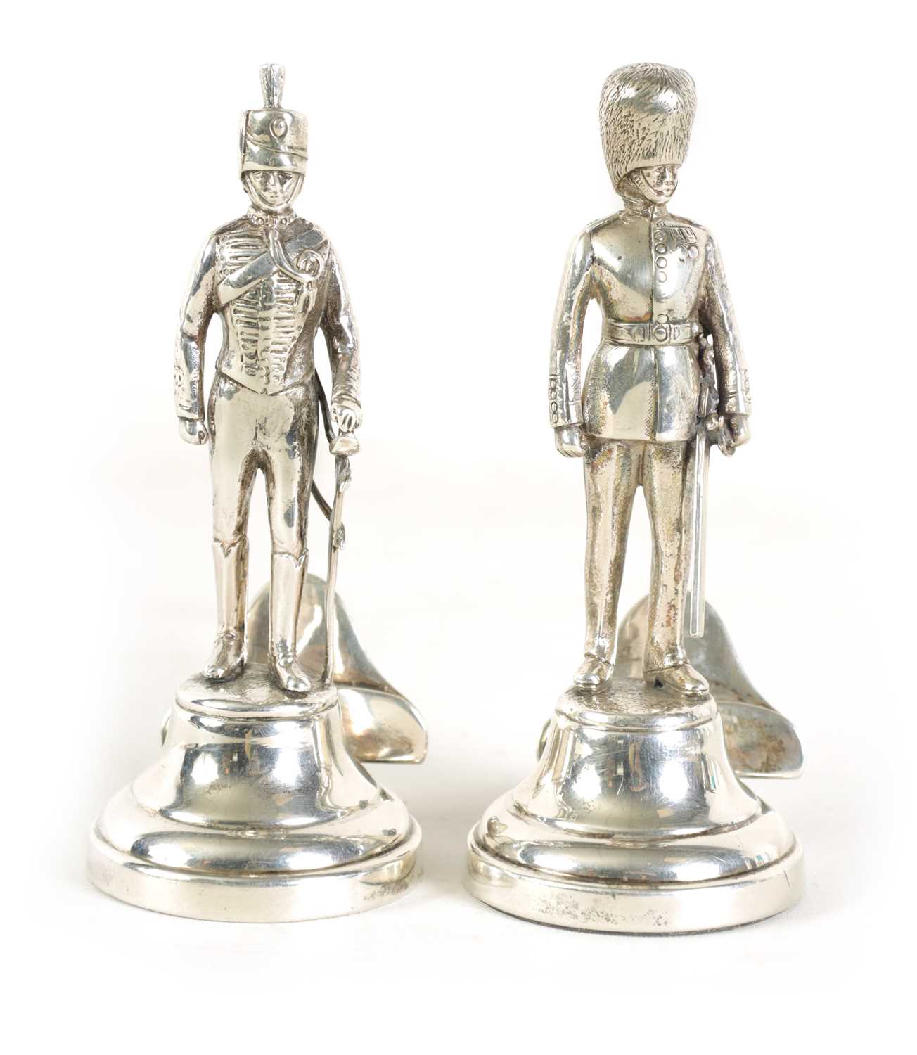 Lot 357 - TWO LARGE SILVER FIGURAL GUARD MENU HOLDERS