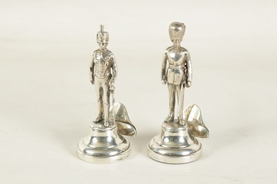 Lot 357 - TWO LARGE SILVER FIGURAL GUARD MENU HOLDERS