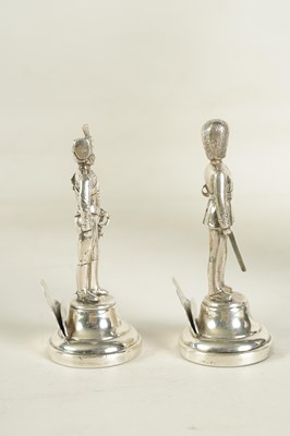 Lot 357 - TWO LARGE SILVER FIGURAL GUARD MENU HOLDERS