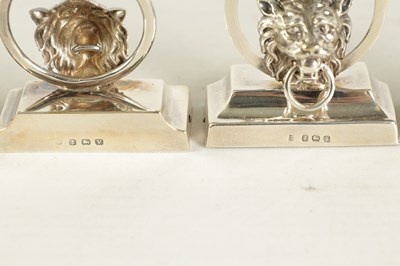 Lot 458 - A CASED SET OF SIX LION MASK DOOR KNOCKER SILVER MENU HOLDERS