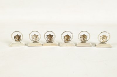 Lot 458 - A CASED SET OF SIX LION MASK DOOR KNOCKER SILVER MENU HOLDERS