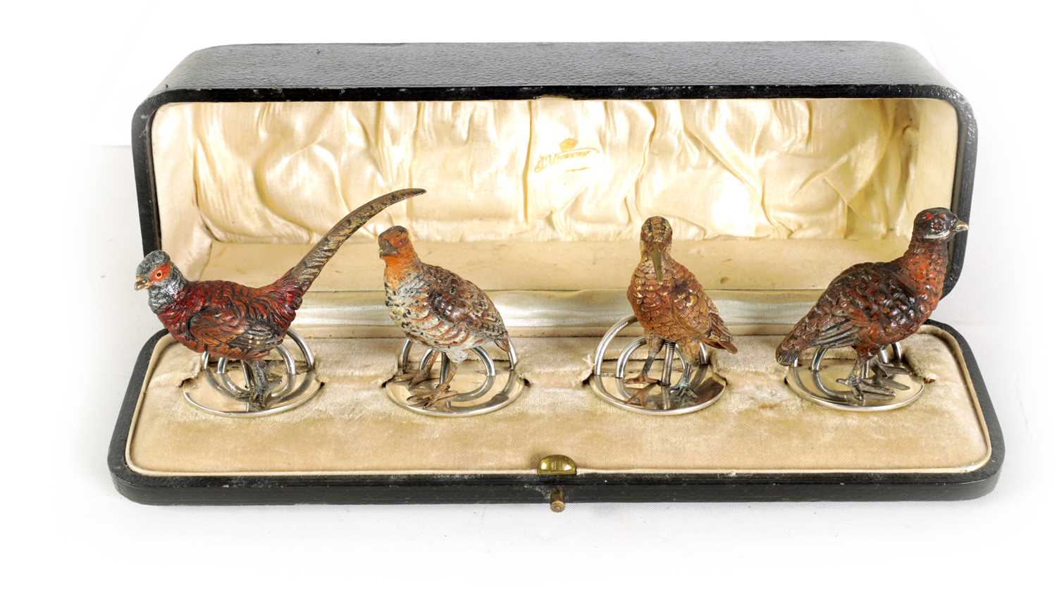Lot 453 - A CASED SET OF LATE 19TH CENTURY FOUR COLD-PAINTED BRONZE AND SILVER GAME BIRDS MENU HOLDERS