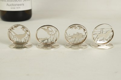 Lot 472 - A SET OF FOUR SILVER SPORTING BIRD AND ANIMAL MENU HOLDERS