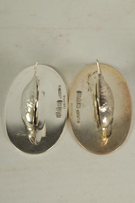 Lot 348 - A SET OF FOUR SILVER FISH MENU HOLDERS