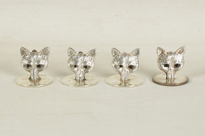 Lot 346 - A CASED SET OF FOUR FOX HEAD SILVER MENU HOLDERS