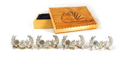 Lot 419 - A BOXED SET OF FOUR LATE 19TH CENTURY QUEEN VICTORIA'S DIAMOND JUBILEE SILVER MENU HOLDERS