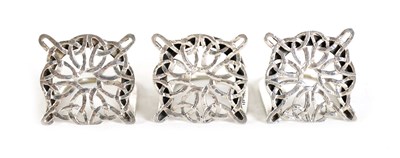 Lot 368 - A SET OF THREE LIBERTY & CO SILVER CELTIC DESIGN MENU HOLDERS