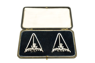 Lot 409 - A CASED PAIR OF SILVER THISTLE MENU HOLDERS