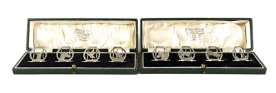 Lot 417 - A PRESENTATION CASED SET OF EIGHT SILVER ANIMALIER AND SPORTING MENU HOLDERS