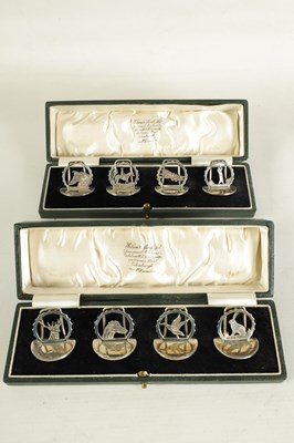 Lot 417 - A PRESENTATION CASED SET OF EIGHT SILVER ANIMALIER AND SPORTING MENU HOLDERS