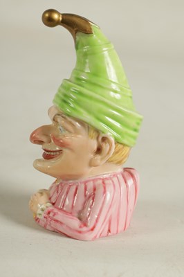 Lot 25 - A RARE ROYAL WORCESTER “MR PUNCH” CANDLE EXTINGUISHER