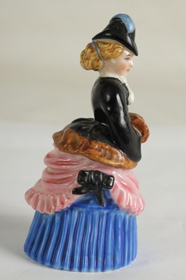 Lot 19 - A RARE ROYAL WORCESTER “ENGLISH LADY” CANDLE EXTINGUISHER