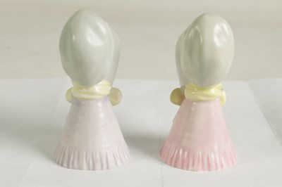 Lot 22 - OLD WOMAN AND YOUNG GIRL TWO ROYAL WORCESTER CANDLE EXTINGUISHERS