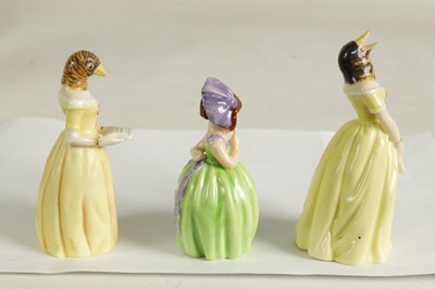 Lot 34 - HUSH, CONFIDENCE AND DIFFIDENCE. THREE ROYAL WORCESTER CANDLE EXTINGUISHERS