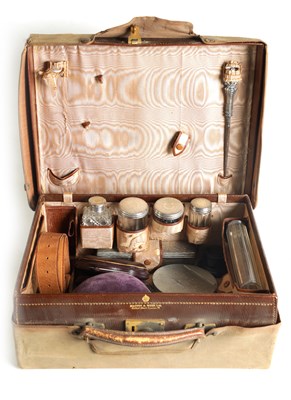 Lot 276 - A VICTORIAN BROWN LEATHER PARTLY FITTED DRESSING CASE