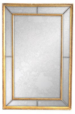 Lot 1009 - AN 18TH CENTURY GILTWOOD HANGING MIRROR