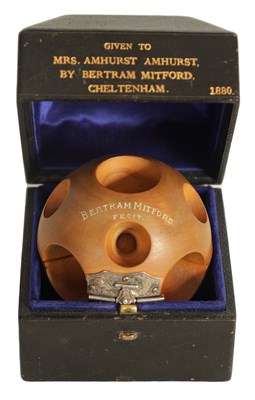 Lot 869 - A LATE 19TH CENTURY FRUITWOOD PUZZLE BALL MADE BY BERTRAM MITFORD 1880