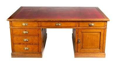 Lot 1006 - A LATE 19TH CENTURY OAK PARTNERS DESK