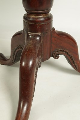 Lot 1211 - A GEORGE III TILT-TOP TABLE MADE OF UNUSUAL TIMBER-POSSIBLY TEAK