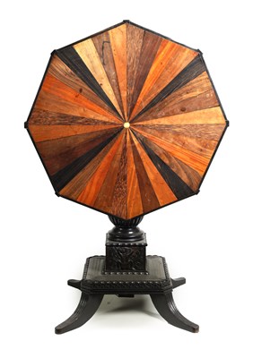 Lot 144 - A LATE 19TH CENTURY CEYLONESE INLAID AND CARVED EBONY TILT TOP TABLE