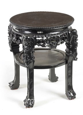 Lot 260 - A 19TH CENTURY CHINESE HARDWOOD CIRCULAR JARDINIERE STAND