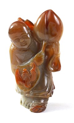 Lot 178 - A CHINESE CARVED CARNELIAN AGATE FIGURAL SCENT BOTTLE