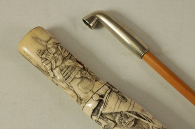 Lot 141 - A MEIJI PERIOD JAPANESE CARVED ANTLER PIPE CASE