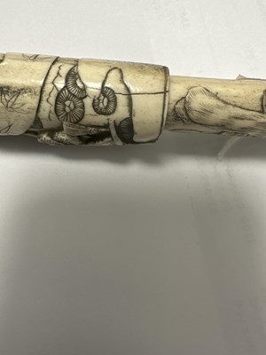 Lot 141 - A MEIJI PERIOD JAPANESE CARVED ANTLER PIPE CASE