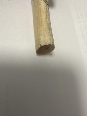 Lot 141 - A MEIJI PERIOD JAPANESE CARVED ANTLER PIPE CASE