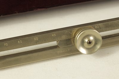 Lot 405 - A CASED ADJUSTABLE PROPORTIONAL SILVERED COMPASS BY W.F. STANLEY, LONDON